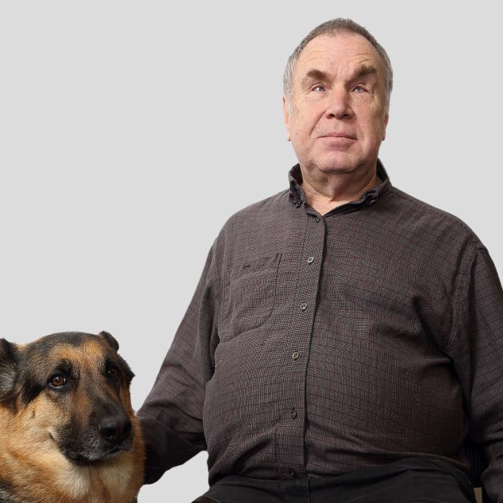 Barry Abbott, Accessibility Advisory Board member, and his guide dog
